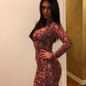 A snakeprint tight dress 🐍